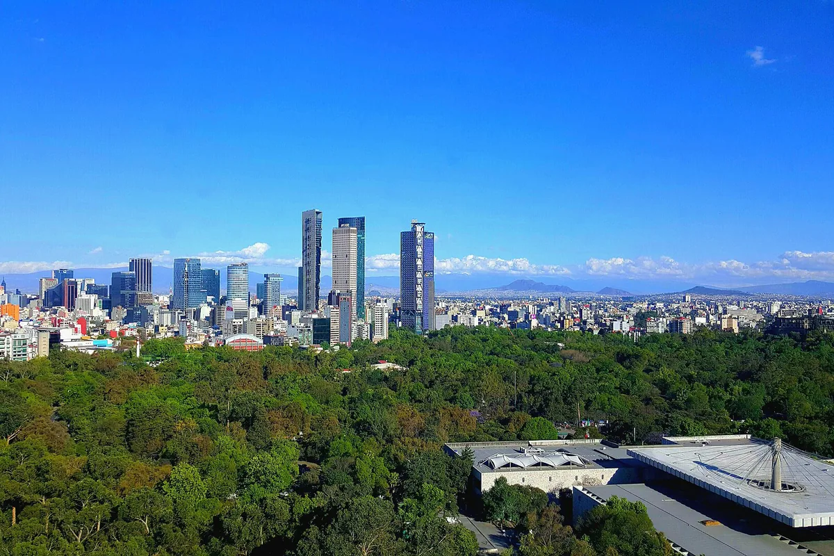 View across Chapultepec Park to Mexico City’s skyline